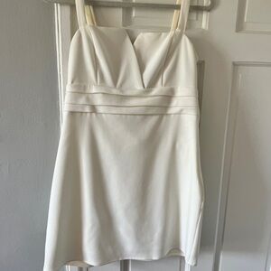 White bow back dress. Mini size large. Bloomingdale’s
